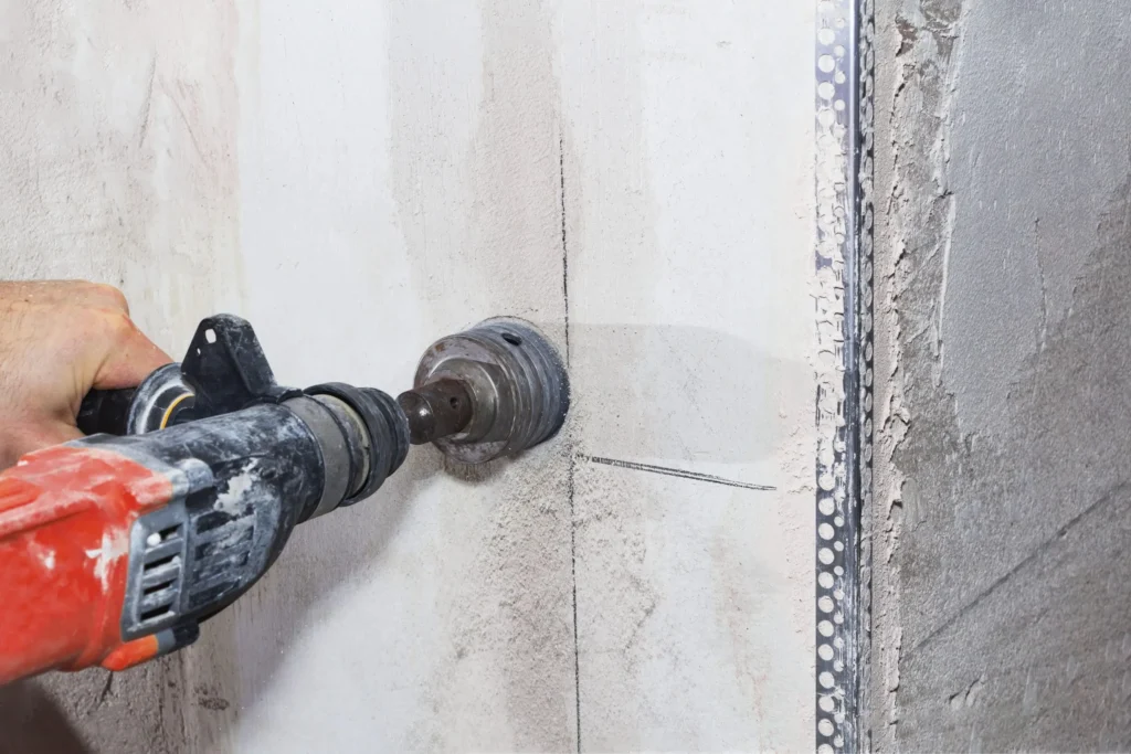 Concrete wall penetration created for air conditioning and services installation using Core Drilling Auckland methods.